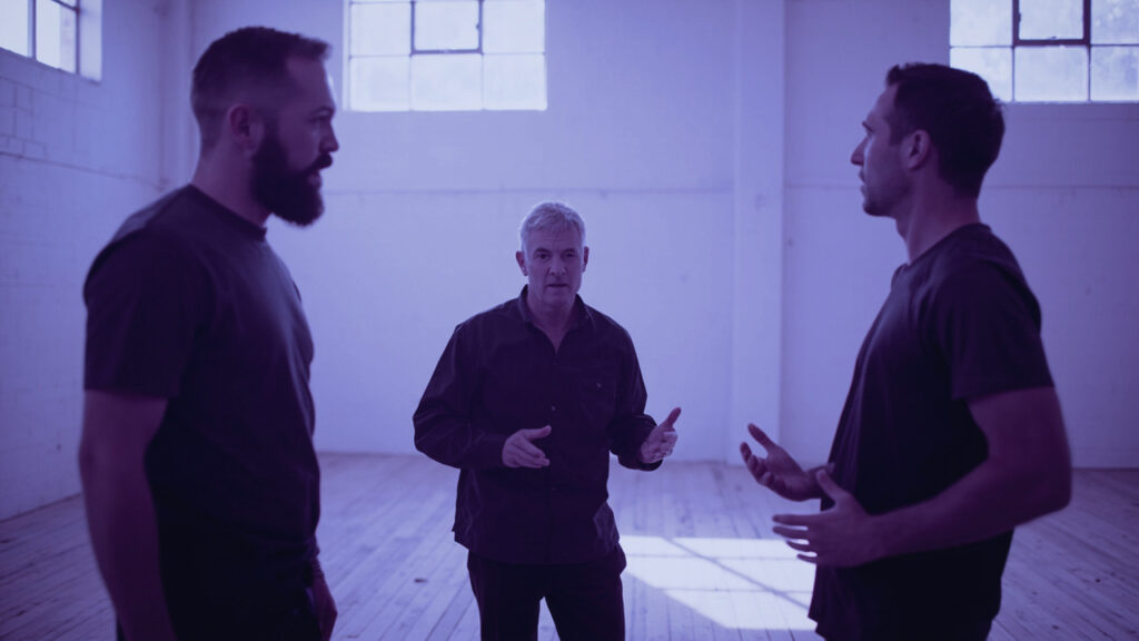 survival before control - trainers in discussion during a physical intervention trainer CPD